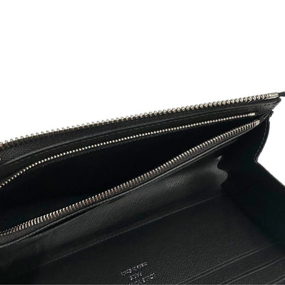 interno Portafoglio Louis Vuitton in canvas Damier Graphite con parti metalliche argentate; munito di un polsino. Completo di corredo, di lusso, originale, ottime condizioni. 