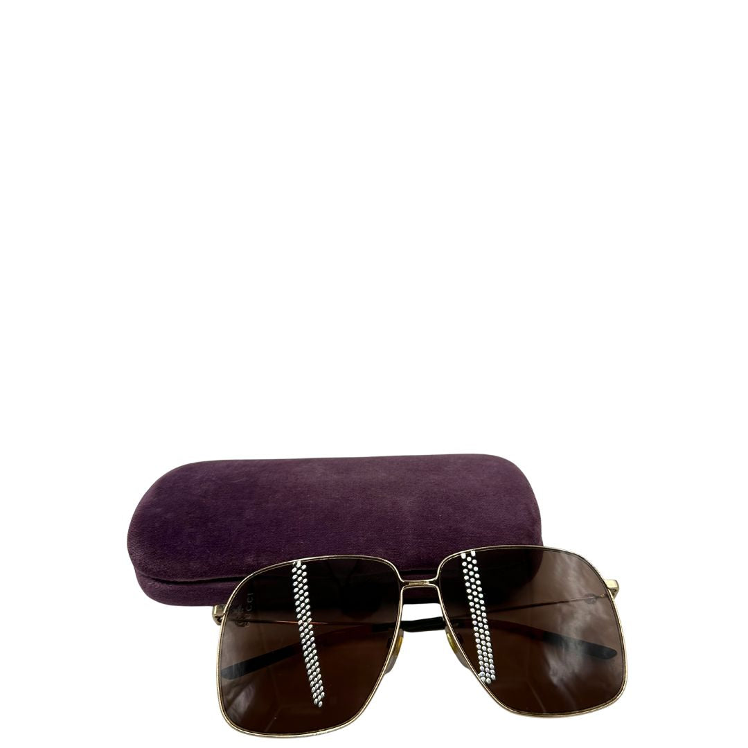 occhiali da sole Gucci in metallo dorato e asticelle con gli iconici colori Web. Completi di custodia, di lusso, originale, ottime condizioni.