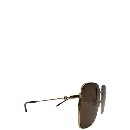 occhiali da sole Gucci in metallo dorato e asticelle con gli iconici colori Web. Completi di custodia, di lusso, originale, ottime condizioni.