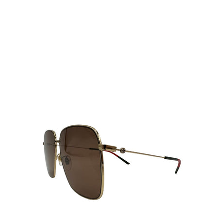 occhiali da sole Gucci in metallo dorato e asticelle con gli iconici colori Web. Completi di custodia, di lusso, originale, ottime condizioni.