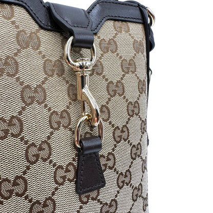  Borsa Gucci in tessuto GG monogram beige con finiture in pelle marroni testa di moro e parti metalliche dorate, munita di una tracolla in tessuto Web verde e rosso. Completa di dustbag. Originale, usata, di lusso, in ottime condizioni