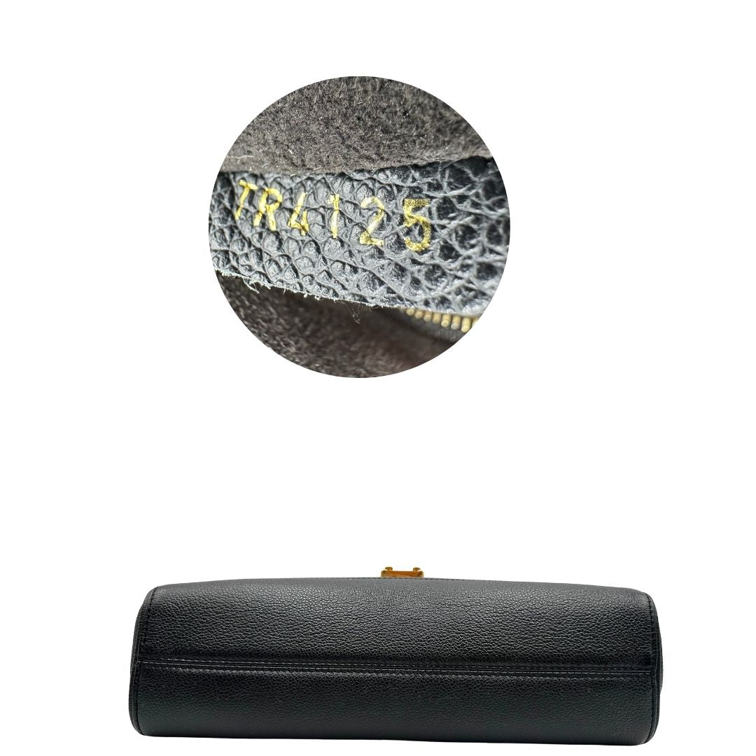 base Borsa Louis Vuitton in pelle nera monogram Empreinte con parti metalliche dorate; munita di una tracolla scorrevole in catena con spallaccio in pelle, di lusso, originale, ottime condizioni. 