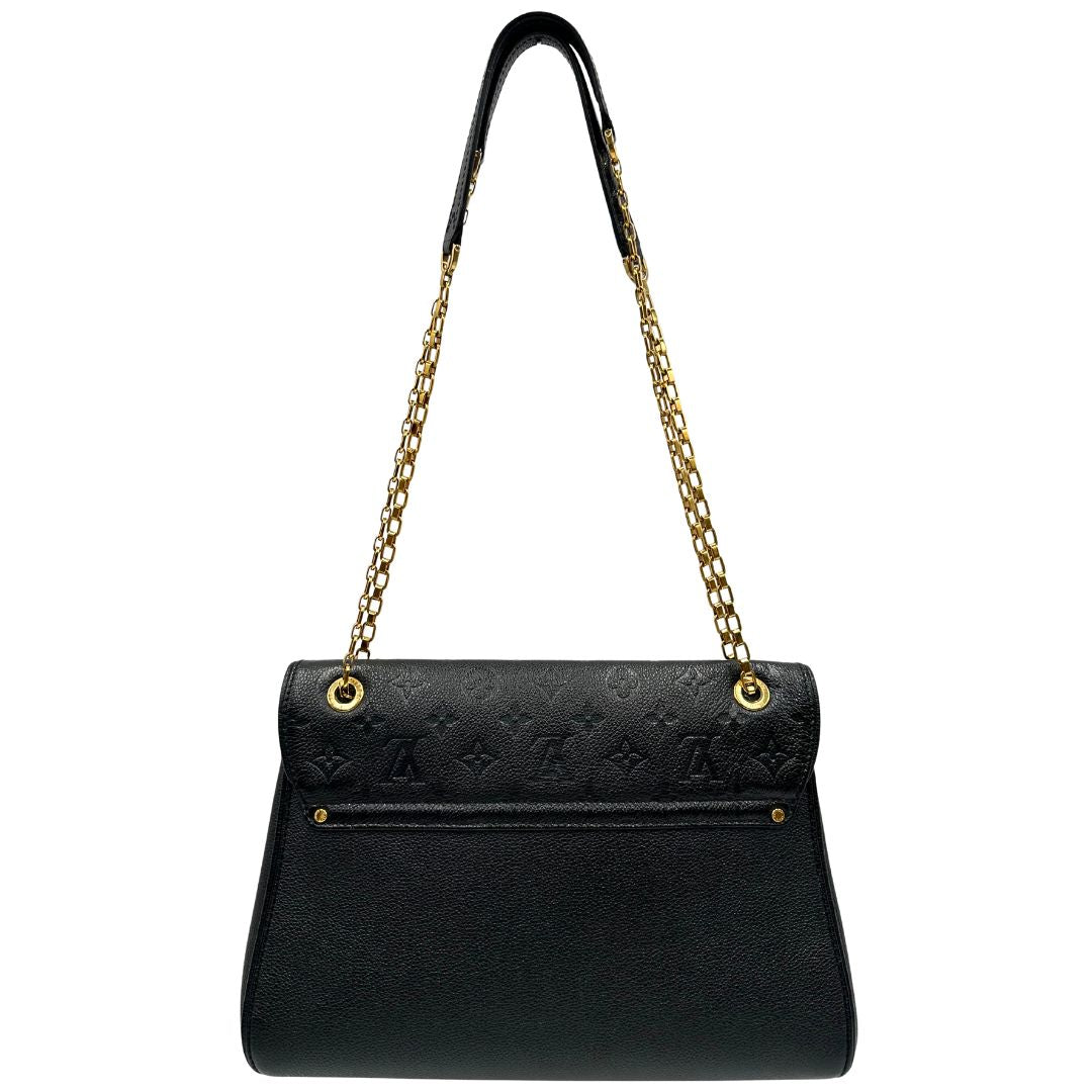 retro Borsa Louis Vuitton in pelle nera monogram Empreinte con parti metalliche dorate; munita di una tracolla scorrevole in catena con spallaccio in pelle, di lusso, originale, ottime condizioni. 