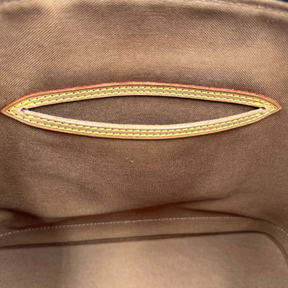 interno Borsa Louis Vuitton in canvas marrone monogram con finiture in vacchetta naturale e parti metalliche dorate; munita di doppi manici stondati, da portare a mano. Completa di chiavi e lucchetto, di lusso, originale, ottime condizioni. 