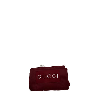 dustbag Mini bucket Gucci in pelle nera con parti metalliche dorate; munito di una tracolla in tessuto Web verde e rossa. Completo di dustbag, di lusso, eccellenti condizioni, originale, usato.