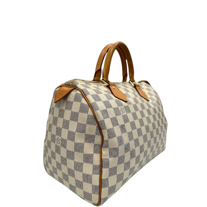 lato  Borsa Speedy 30 Louis Vuitton in canvas Damier Azur con finiture in vacchetta naturale e parti metalliche dorate. Completo di lucchetto, chiavi e corredo, di lusso, originale, ottime condizioni. 