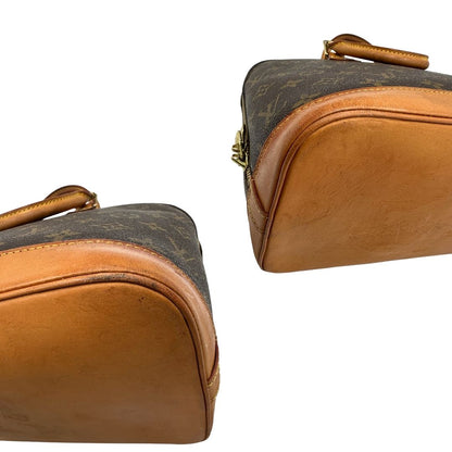 angoli  Borsa Louis Vuitton in canvas marrone monogram con finiture in vacchetta naturale e parti metalliche dorate; munita di doppi manici stondati, da portare a mano, di lusso, originale, ottime condizioni.