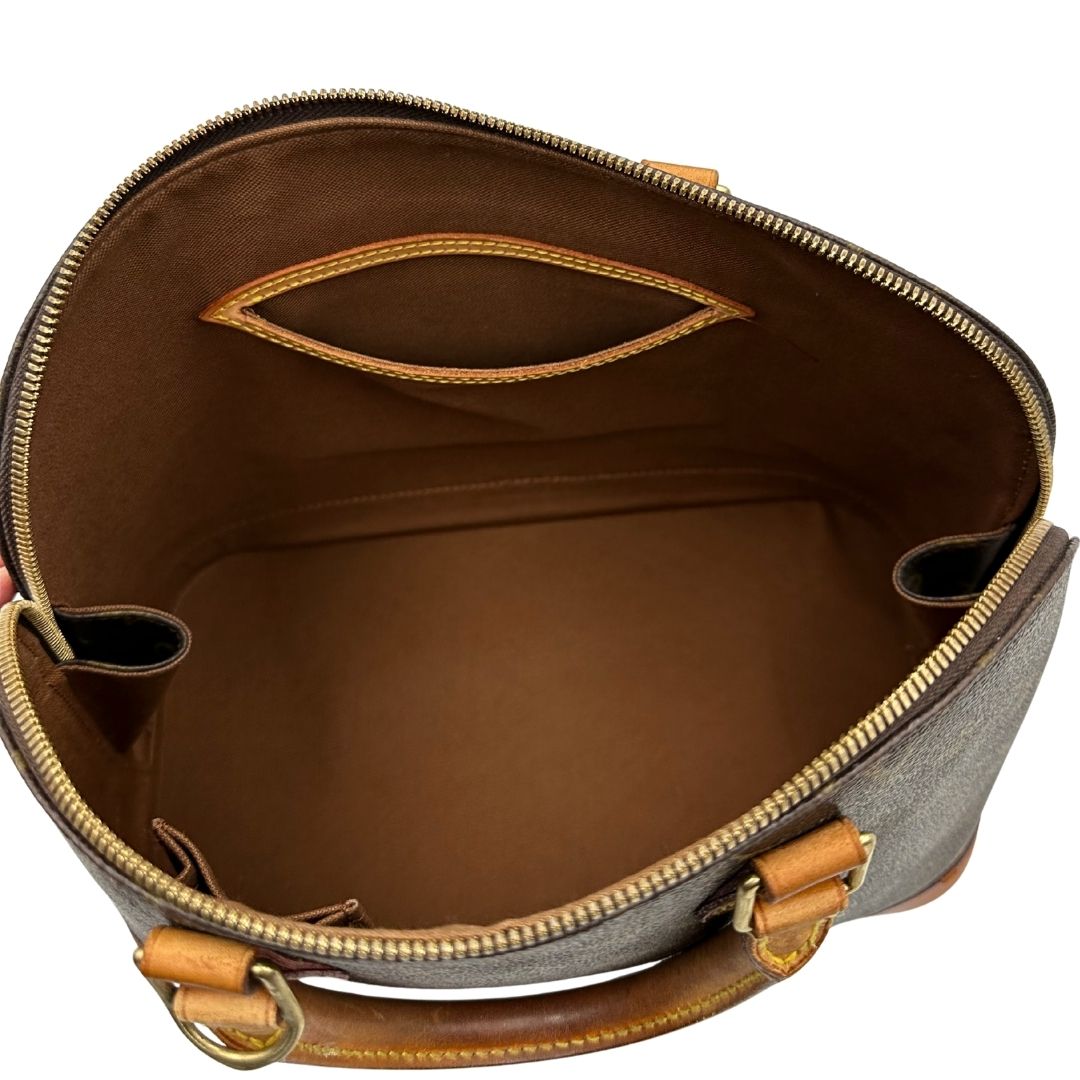 interno Borsa Louis Vuitton in canvas marrone monogram con finiture in vacchetta naturale e parti metalliche dorate; munita di doppi manici stondati, da portare a mano, di lusso, originale, ottime condizioni.