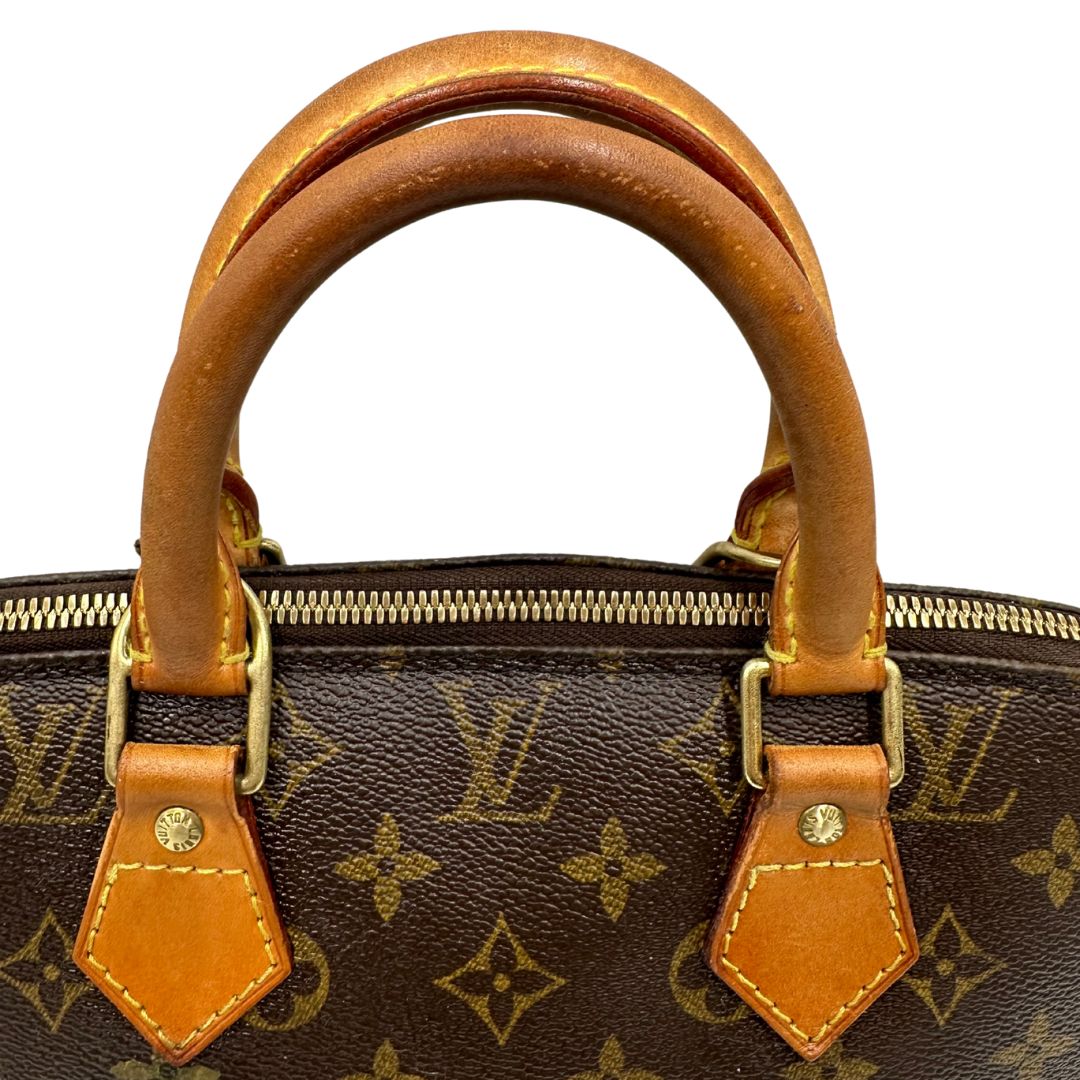 manici  Borsa Louis Vuitton in canvas marrone monogram con finiture in vacchetta naturale e parti metalliche dorate; munita di doppi manici stondati, da portare a mano, di lusso, originale, ottime condizioni. 