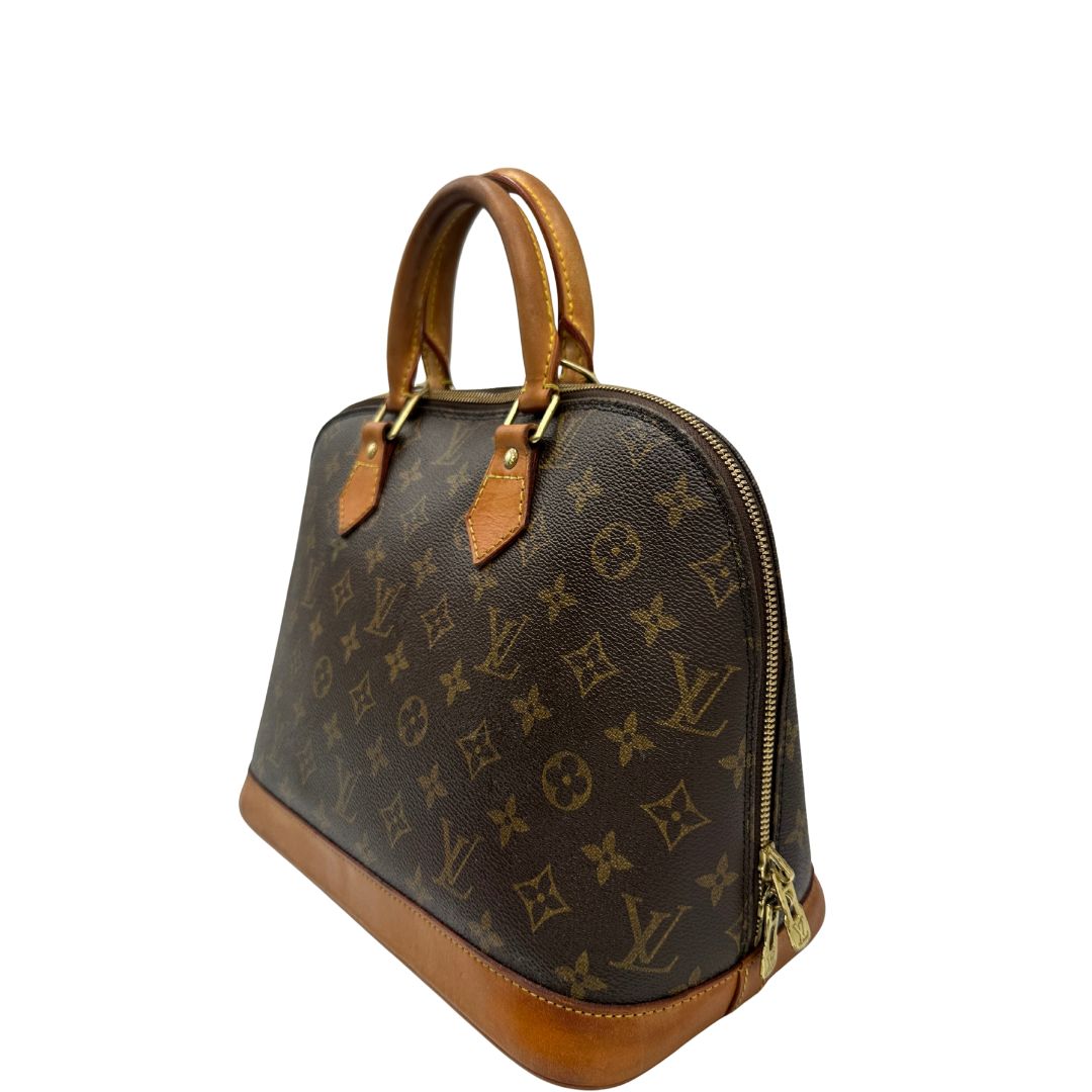 lato  Borsa Louis Vuitton in canvas marrone monogram con finiture in vacchetta naturale e parti metalliche dorate; munita di doppi manici stondati, da portare a mano, di lusso, originale, ottime condizioni. 