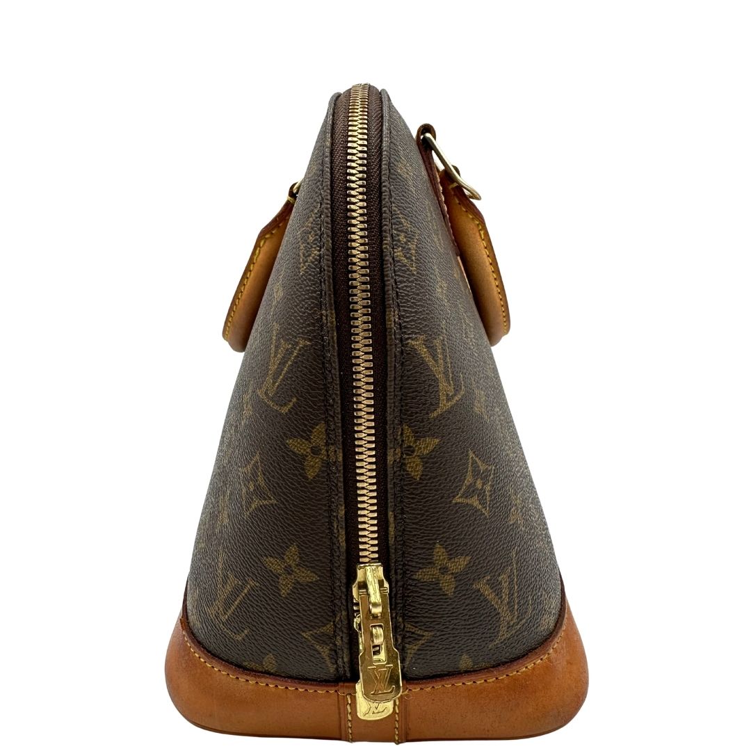 lato  Borsa Louis Vuitton in canvas marrone monogram con finiture in vacchetta naturale e parti metalliche dorate; munita di doppi manici stondati, da portare a mano, di lusso, originale, ottime condizioni. 