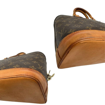 angoli  Borsa Louis Vuitton in canvas marrone monogram con finiture in vacchetta naturale e parti metalliche dorate; munita di doppi manici stondati, da portare a mano, di lusso, originale, ottime condizioni. 