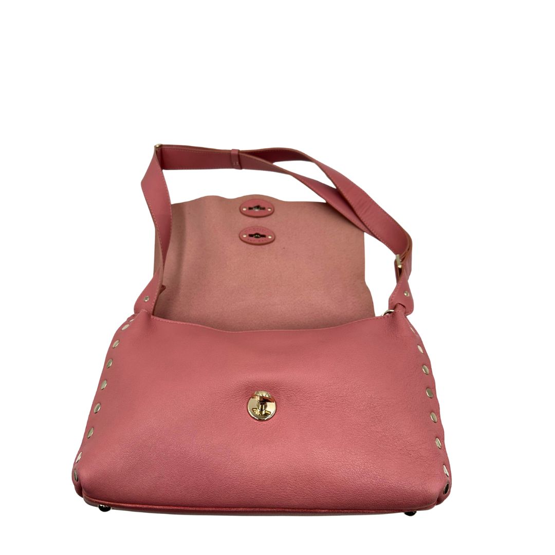 Borsa Zanellato in pelle rosa con parti metalliche in oro chiaro munita di un manico singolo e una tracolla amovibile e regolabile. Originale, usata, di lusso, in ottime condizioni