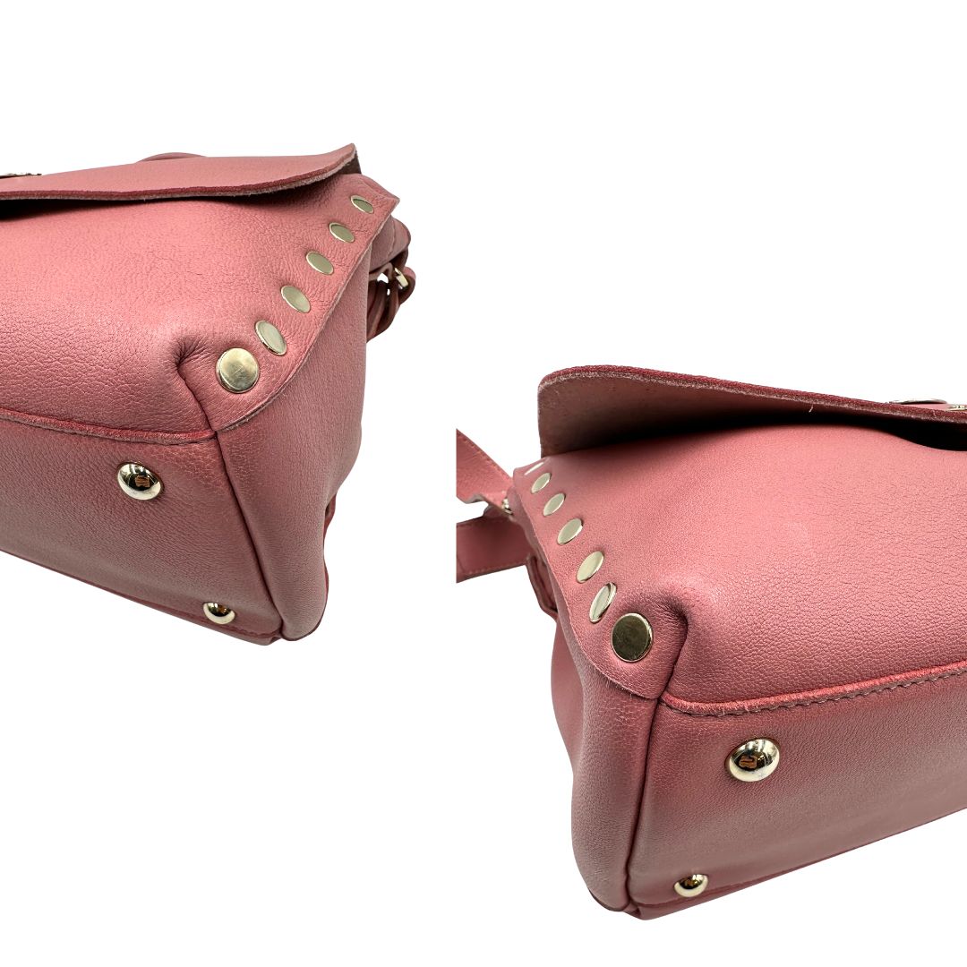 Angoli di una Borsa Zanellato in pelle rosa con parti metalliche in oro chiaro munita di un manico singolo e una tracolla amovibile e regolabile. Originale, usata, di lusso, in ottime condizioni