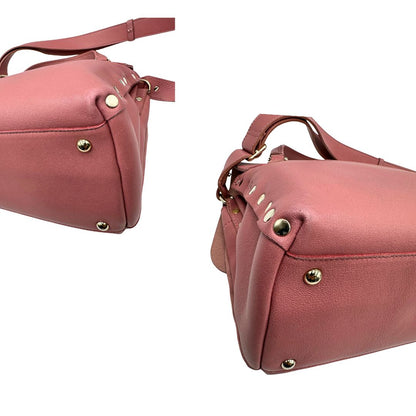 Angoli di una Borsa Zanellato in pelle rosa con parti metalliche in oro chiaro munita di un manico singolo e una tracolla amovibile e regolabile. Originale, usata, di lusso, in ottime condizioni