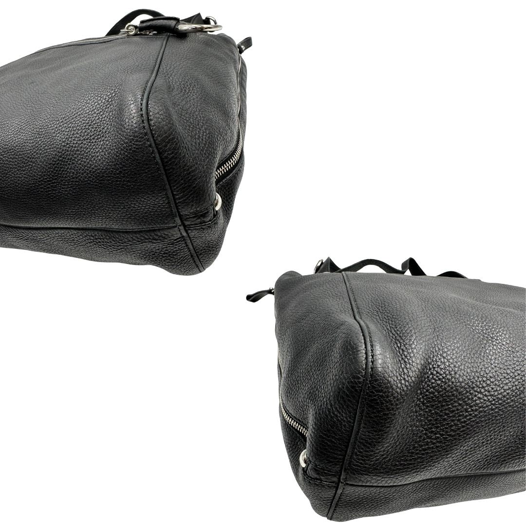 angoli Borsa Gucci in pelle nera martellata con parti metalliche argentate; munita di doppi manici, indossabile a spalla, di lusso, originale, ottime condizioni. 