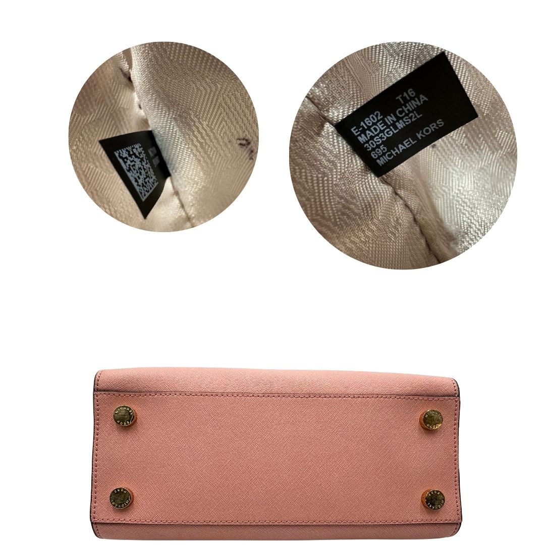 retro  Borsa M.K. in pelle rosa con parti metalliche dorate; munita di doppi manici stondati e una tracolla amovibile e regolabile, di lusso,originale, usata.