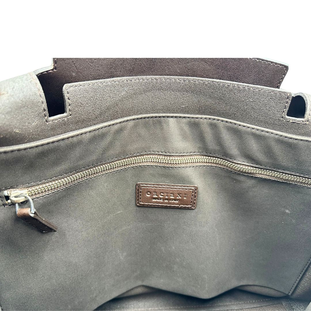 interno Borsa Orciani in pelle marrone con parti metalliche argentate; munita di un manico singolo e una tracolla regolabile. Completa di dustbag, di lusso, originale, ottime condizioni.