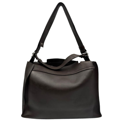 retro Borsa Orciani in pelle marrone con parti metalliche argentate; munita di un manico singolo e una tracolla regolabile. Completa di dustbag, di lusso, originale, ottime condizioni.