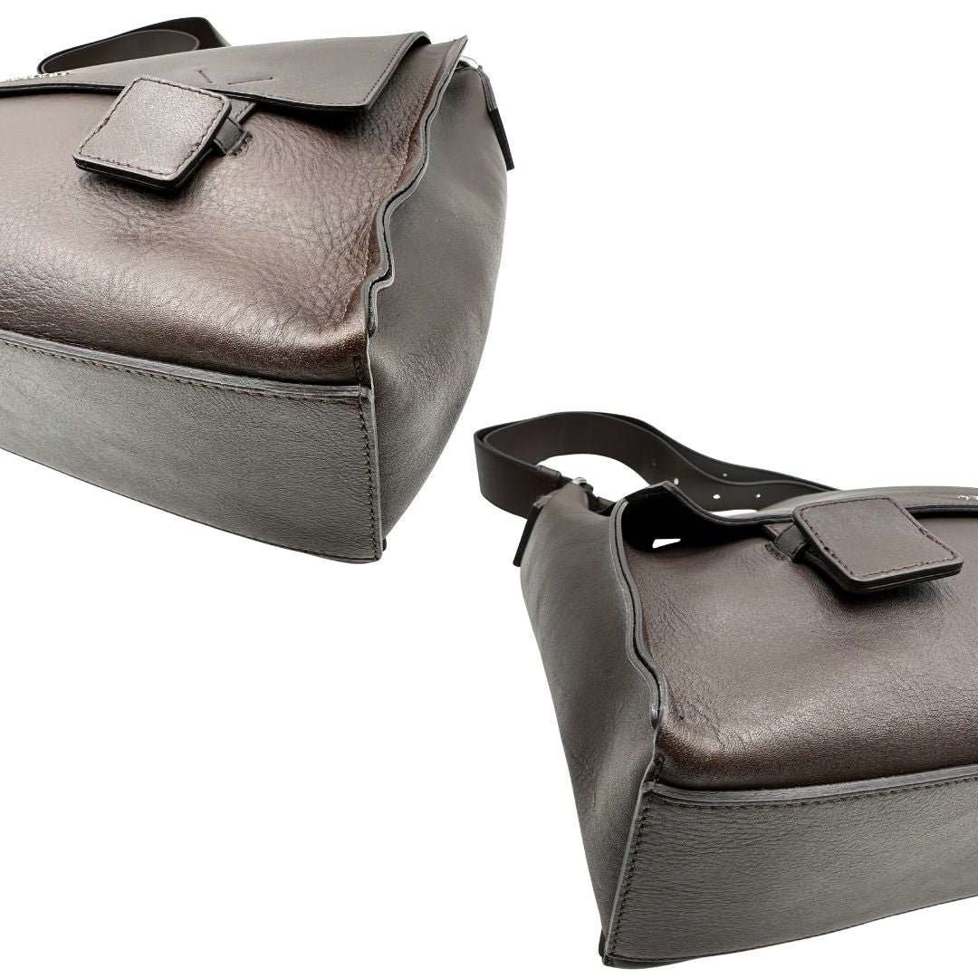 angoli Borsa Orciani in pelle marrone con parti metalliche argentate; munita di un manico singolo e una tracolla regolabile. Completa di dustbag, di lusso, originale, ottime condizioni. 