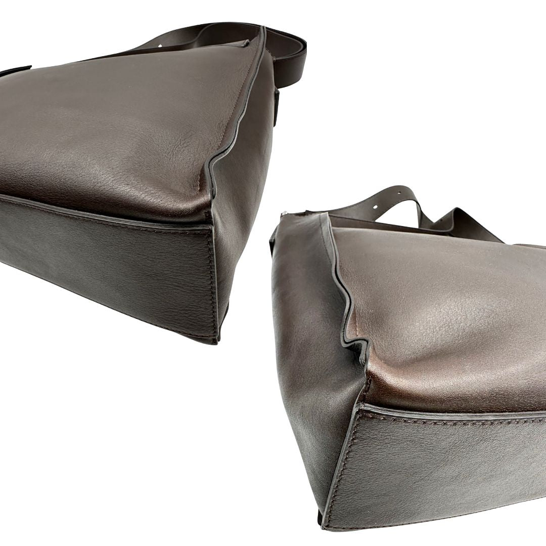 angoli Borsa Orciani in pelle marrone con parti metalliche argentate; munita di un manico singolo e una tracolla regolabile. Completa di dustbag, di lusso, originale, ottime condizioni.