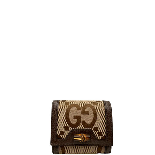 Portafoglio Gucci in tessuto beige GG con finiture in pelle marroni, parti metalliche dorate e dettaglio bamboo sulla chiusura. Completo di corredo, di lusso, originale, eccellenti condizioni.
