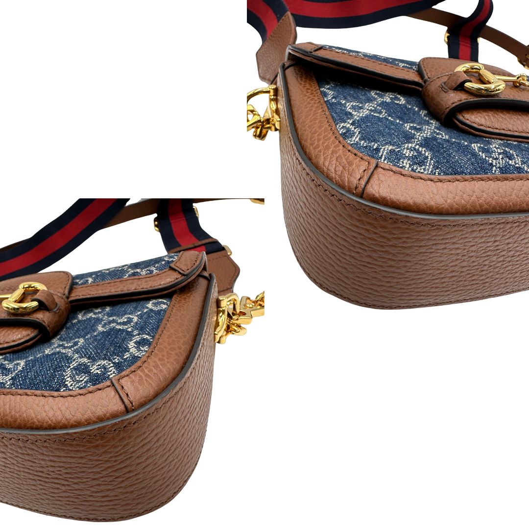 angoli Borsa Gucci in tessuto effetto denim con trama GG , finiture in pelle marroni e parti metalliche dorate; munita di una tracolla Web in tessuto blu e rossa e una tracolla in pelle, entrambe amovibili e regolabili. Completa di dustbag, di lusso, originale, eccellenti condizioni. 