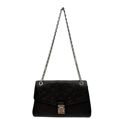 front Borsa Louis Vuitton in pelle nera monogram Empreinte con parti metalliche argentate, impreziosta da mini borchie sul front; munita di una tracolla scorrevole in catena, indossabile a spalla e a tracolla. Completa di corredo, di lusso, originale, ottime condizioni. 