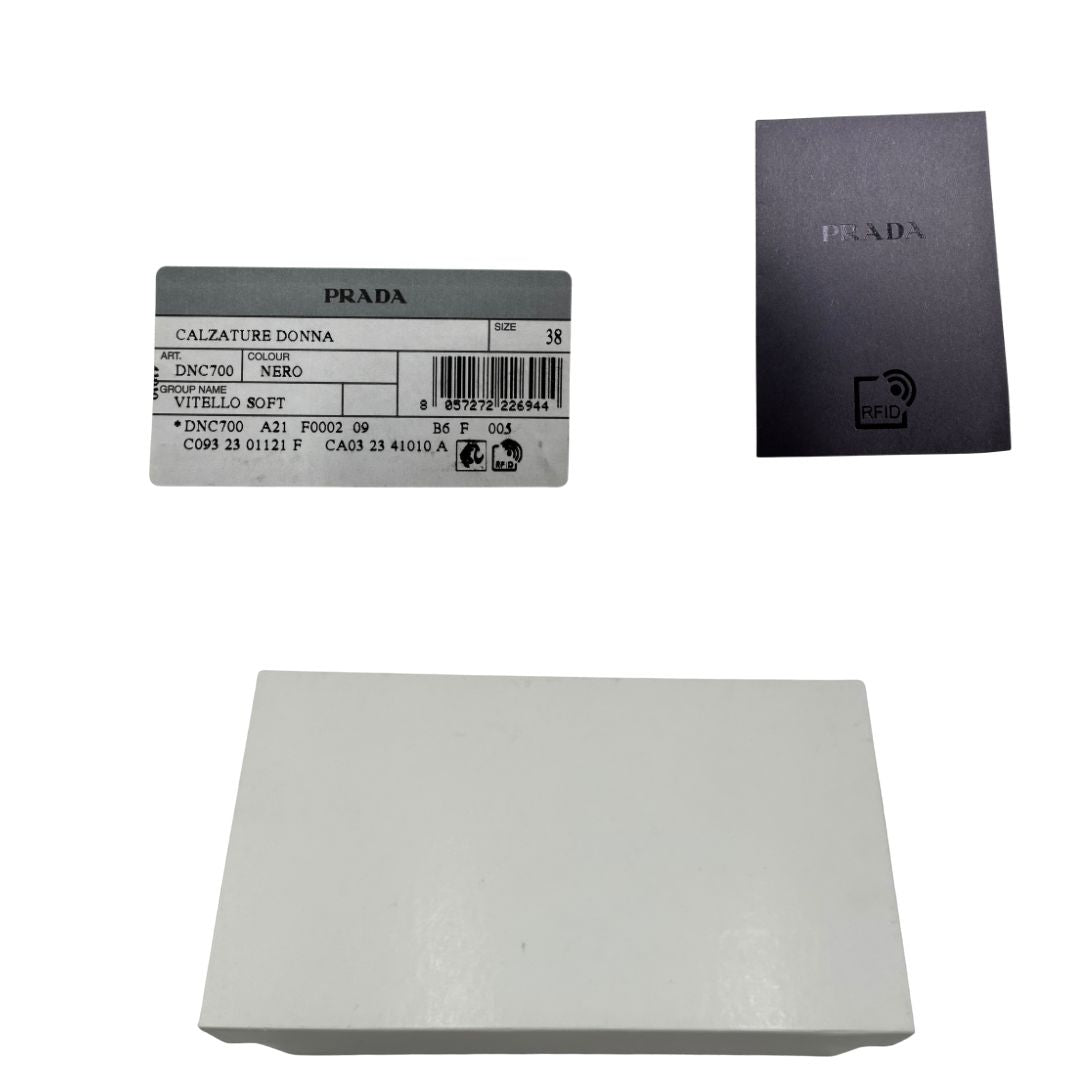  Sneakers Prada in pelle nera con lacci tono su tono. Complete di scatola, di lusso, originali, ottime condizioni.