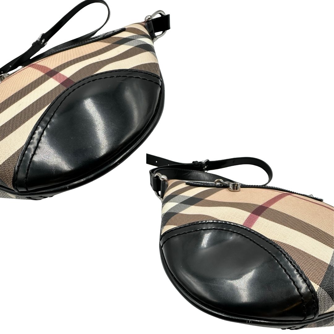 angoli Borsa Burberry in canvas trama tartan con finiture in pelle nera verniciata e parti metalliche argentate; munita di una tracolla regolabile, di lusso, originale, ottime condizioni. 