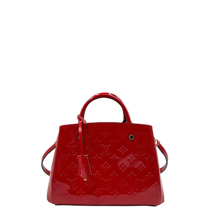 front Borsa Louis Vuitton in pelle vernis monogram rossa con parti metalliche dorate; munita di doppi manici stondati, una tracolla amovibile e una clochette portachiavi. Completa di corredo, di lusso, originale, ottime condizioni, usata. 
