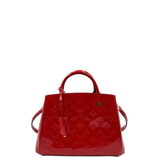 front Borsa Louis Vuitton in pelle vernis monogram rossa con parti metalliche dorate; munita di doppi manici stondati, una tracolla amovibile e una clochette portachiavi. Completa di corredo, di lusso, originale, ottime condizioni, usata. 