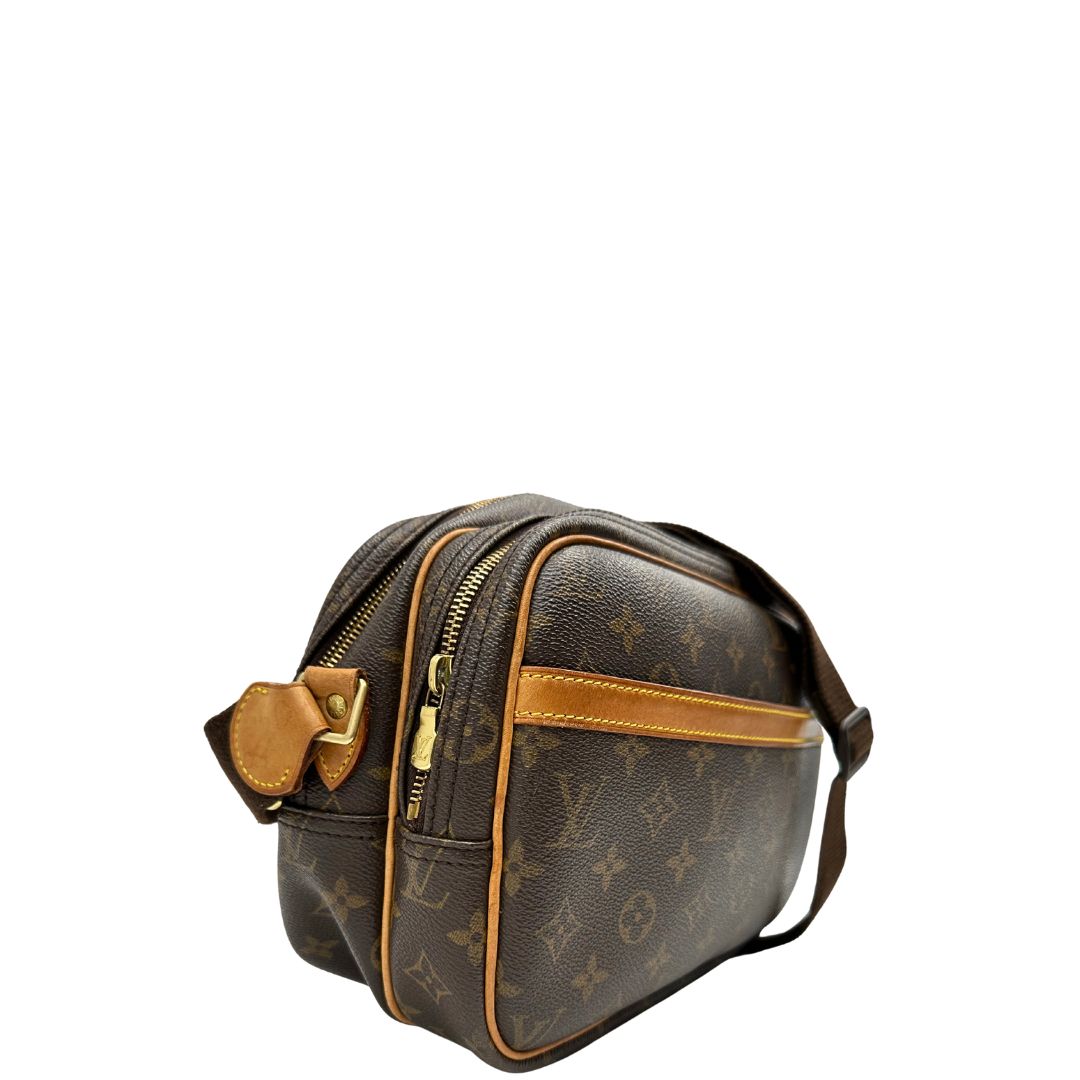 Borsa L.V. in canvas marrone monogram con parti metalliche dorate e finiture in vacchetta naturale; munita di una tracolla in tessuto regolabile, di lusso, originale, ottime condizioni.