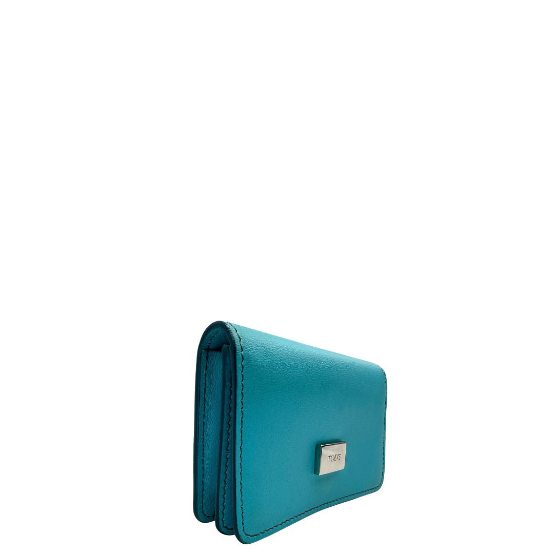 Portafoglio Tod's in pelle color turchese con parti metalliche argentate. Completo di corredo, di lusso, originale, ottime condizioni.