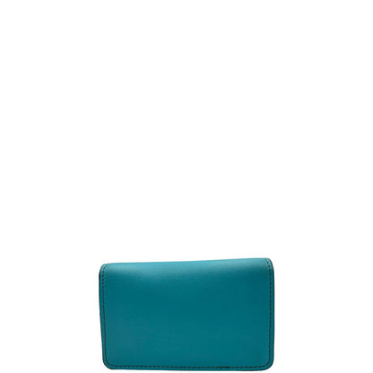 Portafoglio Tod's in pelle color turchese con parti metalliche argentate. Completo di corredo, di lusso, originale, ottime condizioni.