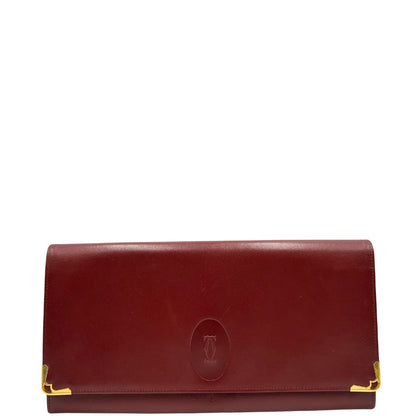 front  Clutch Les Must de Cartier in pelle bordeaux con parti metalliche dorate. Munito di scatola, di lusso, originale. 