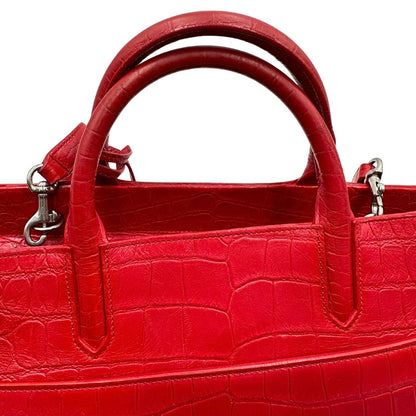manici Borsa Saint Laurent in pelle cocco rossa con parti metalliche argentate: munita di doppi manici stondati e una tracolla amovibile e regolabile. Completa di dustbag, di lusso, originale, ottime condizioni.