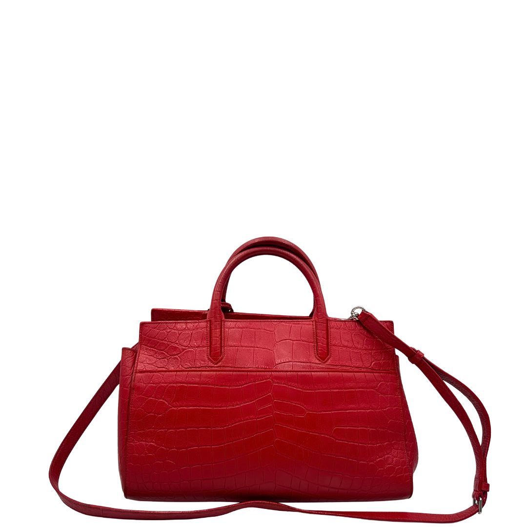 retro Borsa Saint Laurent in pelle cocco rossa con parti metalliche argentate: munita di doppi manici stondati e una tracolla amovibile e regolabile. Completa di dustbag, di lusso, originale, ottime condizioni. 
