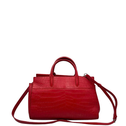 retro Borsa Saint Laurent in pelle cocco rossa con parti metalliche argentate: munita di doppi manici stondati e una tracolla amovibile e regolabile. Completa di dustbag, di lusso, originale, ottime condizioni. 