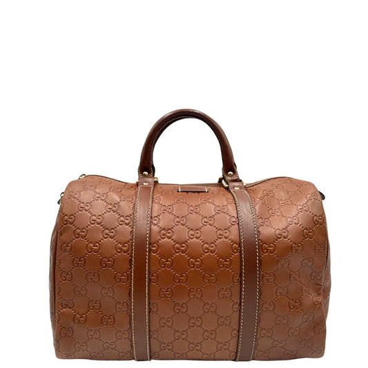 front Borsa Gucci in pelle GG color cognac con parti metalliche dorate; munita di doppi manici stondati, da portare a mano. Completa di dustbag, di lusso, originale, ottime condizioni. 