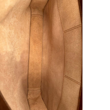 interno  Cartella The Bridge in cuoio marrone con parti metalliche oro anticato; dotata di manico, una tracolla regolabile e amovibile e una clochette portachiavi, di lusso, originale, ottime condizioni, usata. 