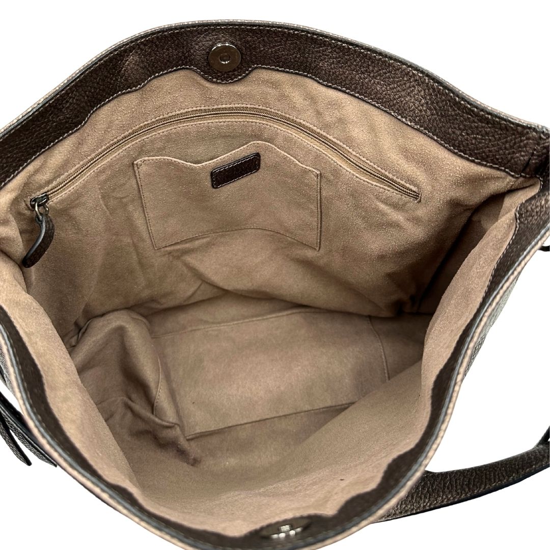 interno Borsa Hogan in pelle color bronzo e parti metalliche argento anticato; munita di un manico singolo e una tracolla amovibile e regolabile. Completa di dustbag, di lusso, originale. 