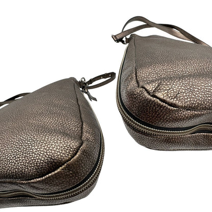 angoli Borsa Hogan in pelle color bronzo e parti metalliche argento anticato; munita di un manico singolo e una tracolla amovibile e regolabile. Completa di dustbag, di lusso, originale. 