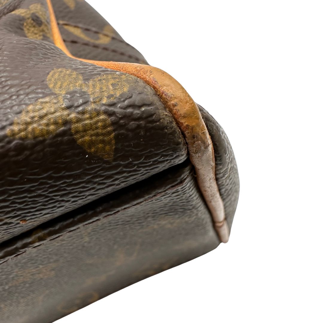 angolo  Borsa Louis Vuitton in canvas marrone monogram con finiture in vacchetta naturale e parti metalliche dorate; munita di doppi manici, di lusso, originale, ottime condizioni. 