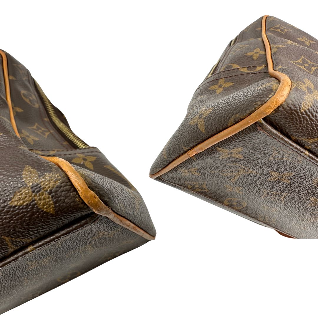 angoli Borsa Louis Vuitton in canvas marrone monogram con finiture in vacchetta naturale e parti metalliche dorate; munita di doppi manici, di lusso, originale, ottime condizioni. 