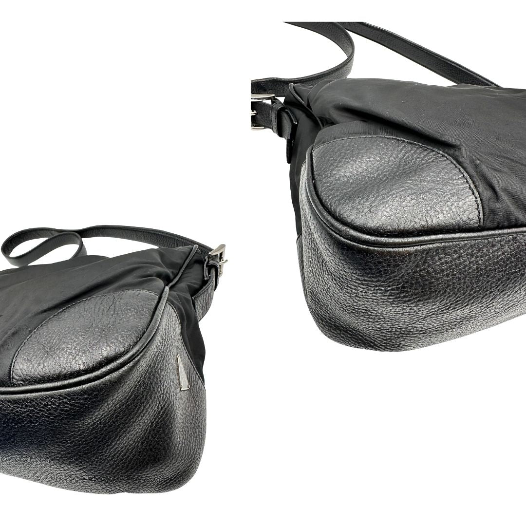 Angoli di una Borsa Prada in nylon nero con parti metalliche argentate e dettagli in pelle tono su tono. Munita di una tracolla regolabile con fibbie, rifinita con logo triangolare sul lato destro. Originale, usata, di lusso, in condizioni buone.