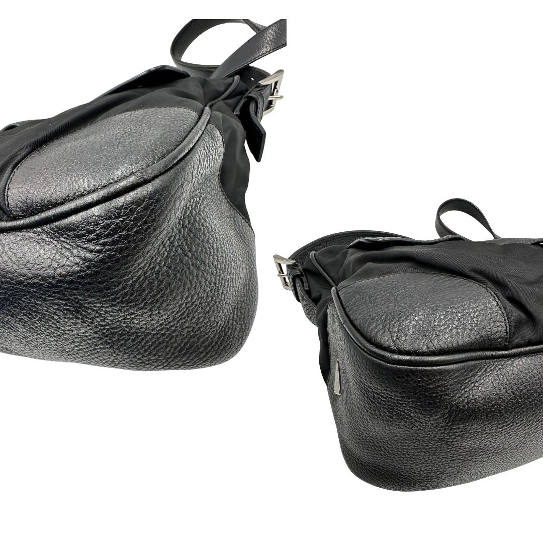 Angoli di una  Borsa Prada in nylon nero con parti metalliche argentate e dettagli in pelle tono su tono. Munita di una tracolla regolabile con fibbie, rifinita con logo triangolare sul lato destro. Originale, usata, di lusso, in condizioni buone.
