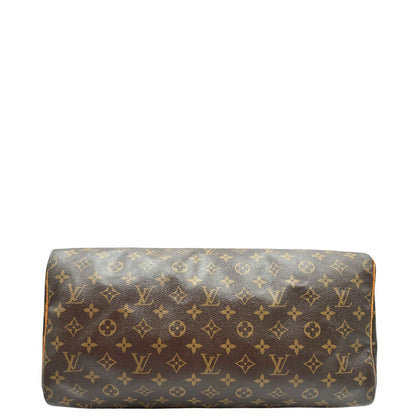 Base di una Borsa Louis Vuitton in canvas marrone monogram con finiture in vacchetta naturale e parti metalliche dorate; munita di doppi manici stondati. Originale, usato, di lusso, in ottime condizioni.