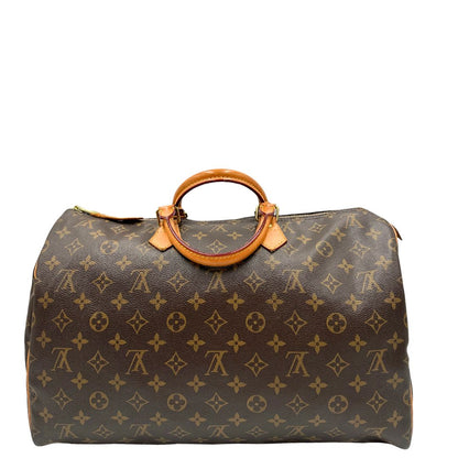 Retro doi una Borsa Louis Vuitton in canvas marrone monogram con finiture in vacchetta naturale e parti metalliche dorate; munita di doppi manici stondati. Originale, usato, di lusso, in ottime condizioni.