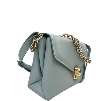 lato Borsa Furla in pelle celeste con parti metalliche dorate; munita di un manico in catena e una tracolla regolabile. Completa di dustbag, di lusso, usata. 